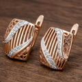 Aoaome Modern Openwork Diamond Accent Huggie Earrings